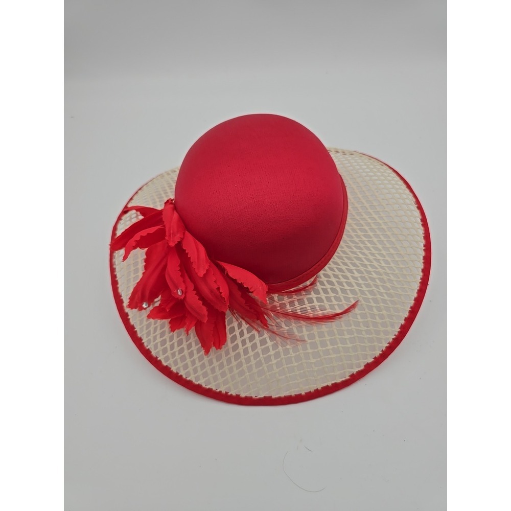 Red Wide-Brimmed Hat with Decorative Embellishment